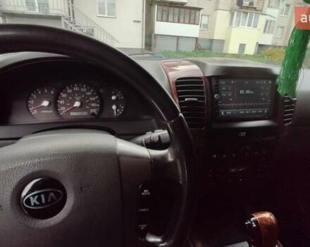 Черный Киа Соренто, объемом двигателя 2.5 л и пробегом 240 тыс. км за 7500 $, фото 20 на Automoto.ua