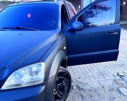 Черный Киа Соренто, объемом двигателя 2.5 л и пробегом 308 тыс. км за 1930 $, фото 1 на Automoto.ua