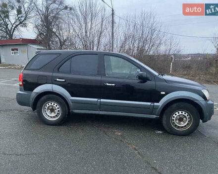 Черный Киа Соренто, объемом двигателя 2.5 л и пробегом 250 тыс. км за 4150 $, фото 7 на Automoto.ua