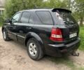 Черный Киа Соренто, объемом двигателя 2.5 л и пробегом 260 тыс. км за 6500 $, фото 7 на Automoto.ua