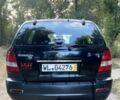 Черный Киа Соренто, объемом двигателя 2.5 л и пробегом 345 тыс. км за 4300 $, фото 3 на Automoto.ua