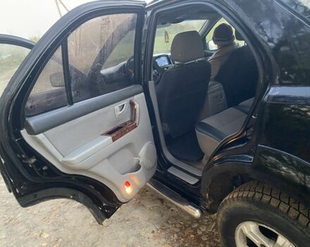 Черный Киа Соренто, объемом двигателя 2.5 л и пробегом 200 тыс. км за 7100 $, фото 11 на Automoto.ua