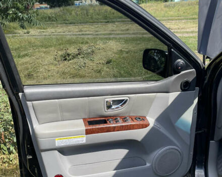 Чорний Кіа Соренто, об'ємом двигуна 2.5 л та пробігом 345 тис. км за 5100 $, фото 10 на Automoto.ua