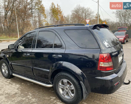 Черный Киа Соренто, объемом двигателя 2.5 л и пробегом 300 тыс. км за 7500 $, фото 4 на Automoto.ua