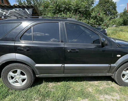 Чорний Кіа Соренто, об'ємом двигуна 2.5 л та пробігом 345 тис. км за 5100 $, фото 2 на Automoto.ua