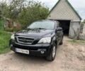 Черный Киа Соренто, объемом двигателя 2.5 л и пробегом 260 тыс. км за 6500 $, фото 1 на Automoto.ua
