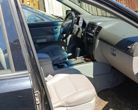 Черный Киа Соренто, объемом двигателя 2.4 л и пробегом 310 тыс. км за 3650 $, фото 6 на Automoto.ua