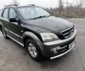 Черный Киа Соренто, объемом двигателя 2.5 л и пробегом 270 тыс. км за 4200 $, фото 2 на Automoto.ua