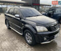 Черный Киа Соренто, объемом двигателя 2.5 л и пробегом 300 тыс. км за 7500 $, фото 1 на Automoto.ua