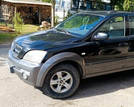 Черный Киа Соренто, объемом двигателя 2.4 л и пробегом 310 тыс. км за 3650 $, фото 2 на Automoto.ua