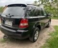 Черный Киа Соренто, объемом двигателя 2.5 л и пробегом 260 тыс. км за 6500 $, фото 1 на Automoto.ua