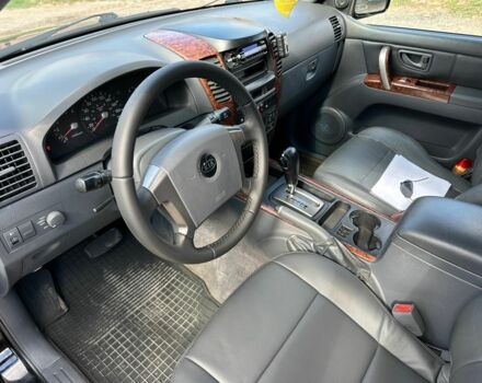 Черный Киа Соренто, объемом двигателя 2.5 л и пробегом 200 тыс. км за 5500 $, фото 2 на Automoto.ua