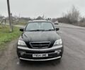 Черный Киа Соренто, объемом двигателя 2.5 л и пробегом 270 тыс. км за 4200 $, фото 1 на Automoto.ua