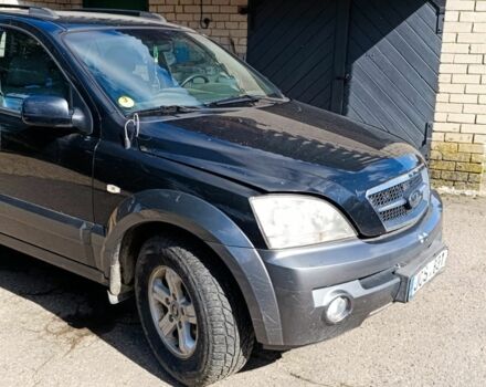 Черный Киа Соренто, объемом двигателя 2.4 л и пробегом 310 тыс. км за 3650 $, фото 5 на Automoto.ua