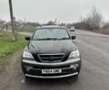 Чорний Кіа Соренто, об'ємом двигуна 2.5 л та пробігом 230 тис. км за 4200 $, фото 1 на Automoto.ua