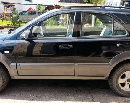 Черный Киа Соренто, объемом двигателя 2.4 л и пробегом 310 тыс. км за 3650 $, фото 3 на Automoto.ua