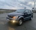 Черный Киа Соренто, объемом двигателя 2.5 л и пробегом 250 тыс. км за 4150 $, фото 1 на Automoto.ua