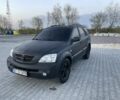 Черный Киа Соренто, объемом двигателя 2.5 л и пробегом 310 тыс. км за 3950 $, фото 1 на Automoto.ua