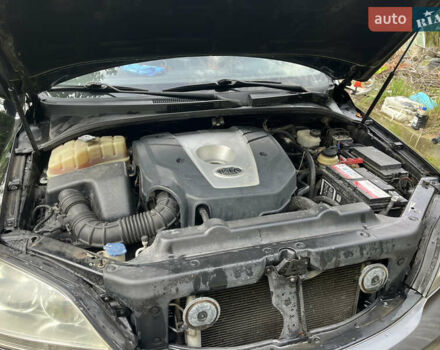 Черный Киа Соренто, объемом двигателя 2.4 л и пробегом 205 тыс. км за 7000 $, фото 16 на Automoto.ua