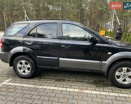 Черный Киа Соренто, объемом двигателя 2.4 л и пробегом 260 тыс. км за 5899 $, фото 2 на Automoto.ua