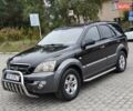 Черный Киа Соренто, объемом двигателя 2.5 л и пробегом 302 тыс. км за 4300 $, фото 1 на Automoto.ua