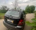 Черный Киа Соренто, объемом двигателя 2.5 л и пробегом 272 тыс. км за 4400 $, фото 3 на Automoto.ua