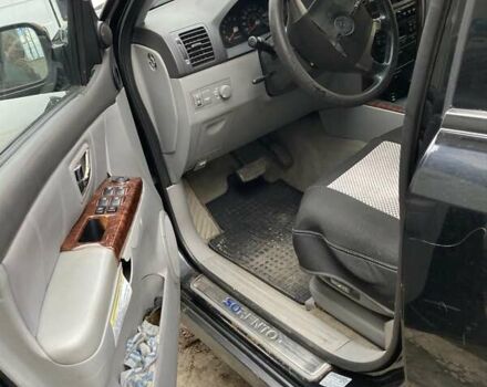 Черный Киа Соренто, объемом двигателя 2.5 л и пробегом 220 тыс. км за 4500 $, фото 6 на Automoto.ua