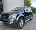 Черный Киа Соренто, объемом двигателя 2.5 л и пробегом 279 тыс. км за 4600 $, фото 1 на Automoto.ua