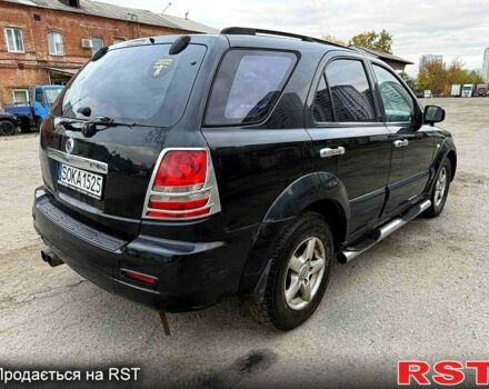 Черный Киа Соренто, объемом двигателя 2.5 л и пробегом 254 тыс. км за 3700 $, фото 5 на Automoto.ua