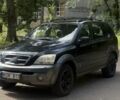 Черный Киа Соренто, объемом двигателя 2.5 л и пробегом 298 тыс. км за 4750 $, фото 1 на Automoto.ua
