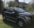 Черный Киа Соренто, объемом двигателя 2.5 л и пробегом 262 тыс. км за 9200 $, фото 1 на Automoto.ua