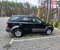 Черный Киа Соренто, объемом двигателя 2.4 л и пробегом 270 тыс. км за 5299 $, фото 2 на Automoto.ua
