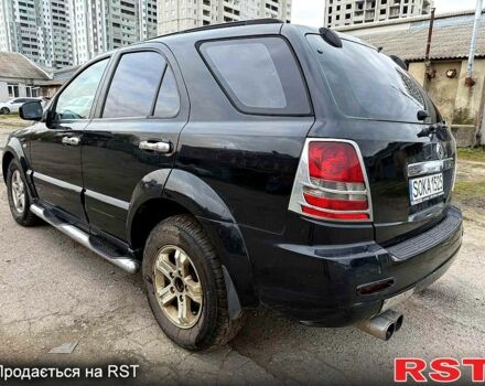 Черный Киа Соренто, объемом двигателя 2.5 л и пробегом 254 тыс. км за 3700 $, фото 2 на Automoto.ua