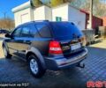 Черный Киа Соренто, объемом двигателя 2.5 л и пробегом 230 тыс. км за 6700 $, фото 1 на Automoto.ua