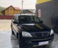 Черный Киа Соренто, объемом двигателя 2.5 л и пробегом 300 тыс. км за 5100 $, фото 1 на Automoto.ua