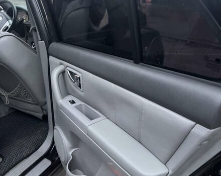 Черный Киа Соренто, объемом двигателя 2.5 л и пробегом 340 тыс. км за 7500 $, фото 14 на Automoto.ua