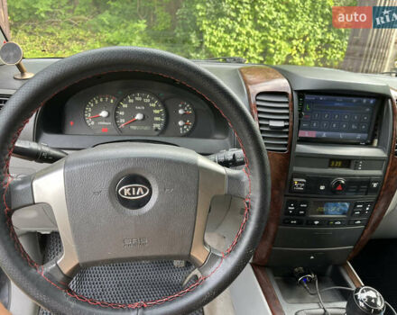 Черный Киа Соренто, объемом двигателя 2.4 л и пробегом 205 тыс. км за 7000 $, фото 11 на Automoto.ua