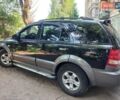 Черный Киа Соренто, объемом двигателя 2.4 л и пробегом 230 тыс. км за 6800 $, фото 1 на Automoto.ua