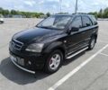 Черный Киа Соренто, объемом двигателя 2.5 л и пробегом 245 тыс. км за 5500 $, фото 1 на Automoto.ua