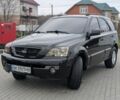 Черный Киа Соренто, объемом двигателя 2.5 л и пробегом 300 тыс. км за 8000 $, фото 2 на Automoto.ua