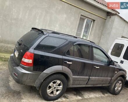 Черный Киа Соренто, объемом двигателя 2.5 л и пробегом 220 тыс. км за 4500 $, фото 10 на Automoto.ua