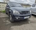 Черный Киа Соренто, объемом двигателя 2.5 л и пробегом 274 тыс. км за 4100 $, фото 1 на Automoto.ua