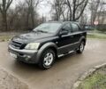 Черный Киа Соренто, объемом двигателя 2.5 л и пробегом 237 тыс. км за 3450 $, фото 1 на Automoto.ua