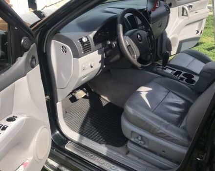 Черный Киа Соренто, объемом двигателя 2.5 л и пробегом 262 тыс. км за 9200 $, фото 1 на Automoto.ua