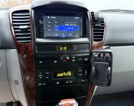 Черный Киа Соренто, объемом двигателя 2.5 л и пробегом 258 тыс. км за 5250 $, фото 23 на Automoto.ua