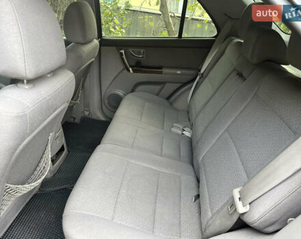 Черный Киа Соренто, объемом двигателя 2.4 л и пробегом 205 тыс. км за 7000 $, фото 12 на Automoto.ua