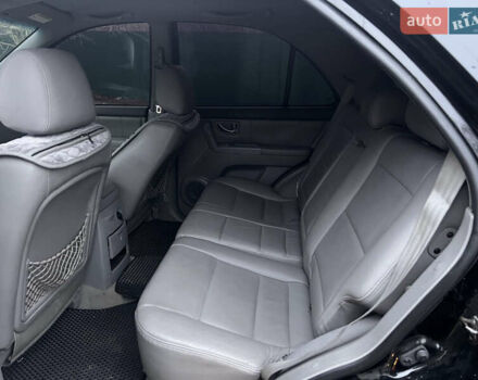 Черный Киа Соренто, объемом двигателя 2.5 л и пробегом 340 тыс. км за 7500 $, фото 12 на Automoto.ua