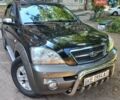 Черный Киа Соренто, объемом двигателя 2.4 л и пробегом 230 тыс. км за 6800 $, фото 1 на Automoto.ua