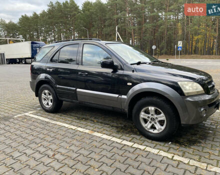 Черный Киа Соренто, объемом двигателя 2.4 л и пробегом 260 тыс. км за 5899 $, фото 3 на Automoto.ua