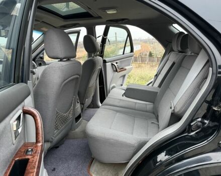 Черный Киа Соренто, объемом двигателя 2.5 л и пробегом 258 тыс. км за 5250 $, фото 15 на Automoto.ua